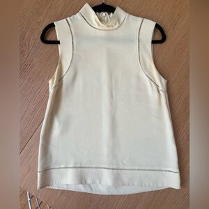 Gucci pale yellow sleeveless turtleneck